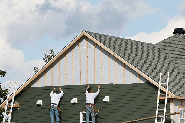 Professional Siding Contractor technician working in Providence, NC